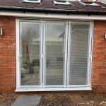 bifold doors installation with roof windows - belfry Windows
