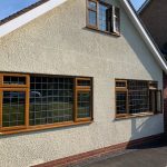 brown window installation - belfry Windows