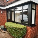 close view of new black windows and doors which have been installed - belfry Windows