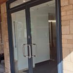 double door installation on home - belfry Windows