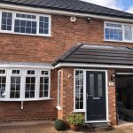front view of home with newly fitted foor and windows - belfry Windows