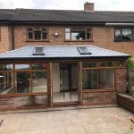 garden view of conservatory wndows and door installation - belfry Windows