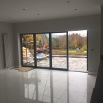 inside view of bifold door installation - belfry Windows