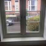 inside view of clients cream window installation - belfry Windows