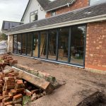 large bifold doors for conservatory garden view - belfry Windows
