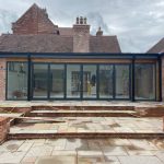long bifold door installation on a conservatory