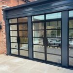 newly addes double doors with painted grey outside - belfry Windows